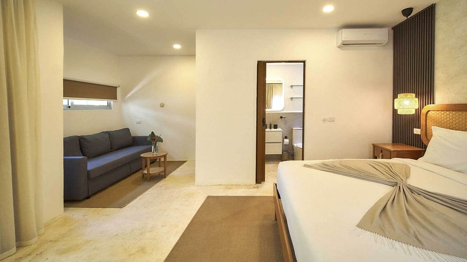 Deluxe Bungalow | Pillowtop beds, minibar, in-room safe, blackout drapes