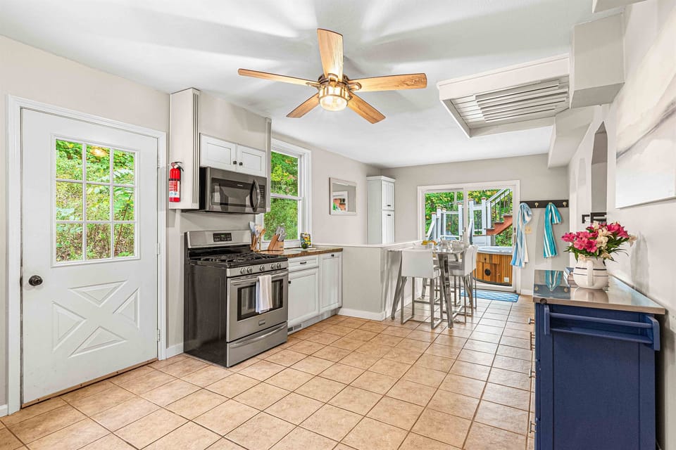 Whip up delicious meals in the bright, fully equipped kitchen, then step out to the pool deck for a BBQ under the sky. Everything you need for a feast at your fingertips! 🍳🌿🏊