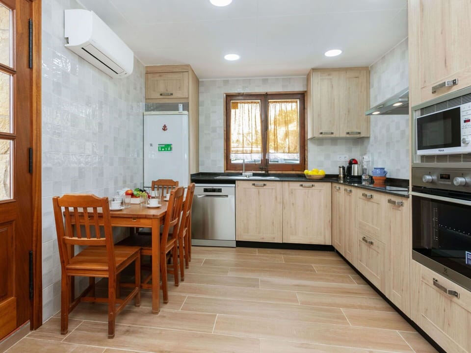 Kitchen, Countertop, Major Appliance, Kitchen Appliance, Wood, Flooring, Interior Design, Furniture, Cabinetry, Floor