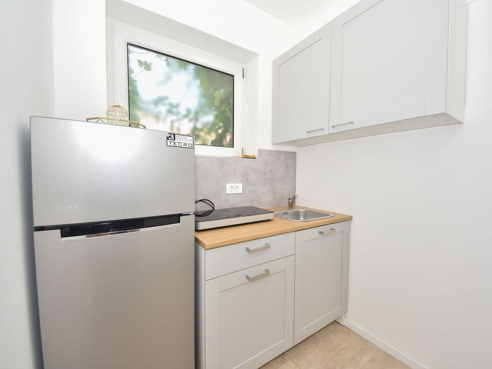 Cabinetry, Building, Interior Design, Wood, Floor, Flooring, Kitchen, House, Major Appliance, Gas