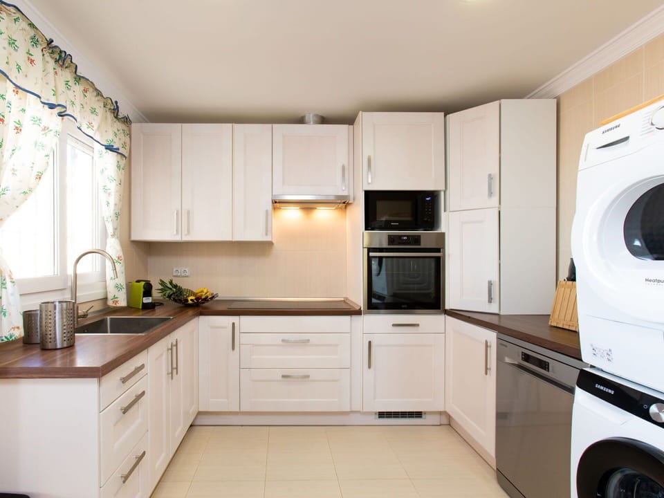 Furniture, Building, Comfort, Table, Wood, Window, Textile, Chair, Curtain, Flooring