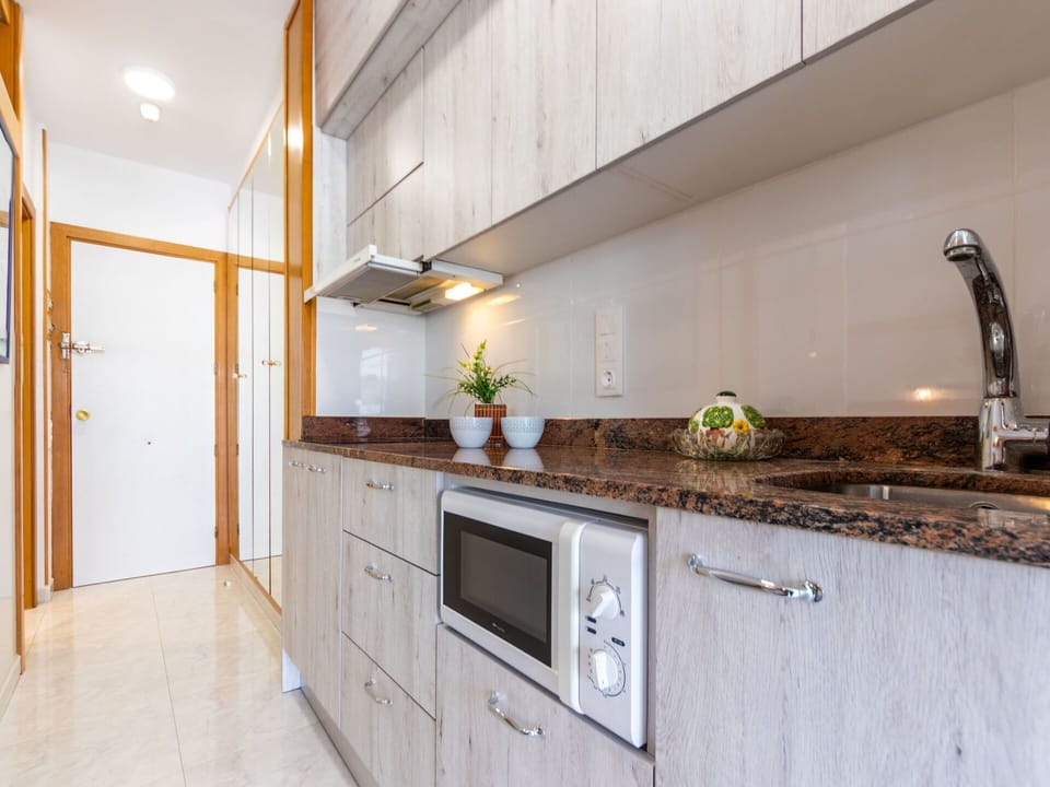 Countertop, Cabinetry, Furniture, Kitchen, Plant, Tap, Sink, Wood, Interior Design, Kitchen Stove