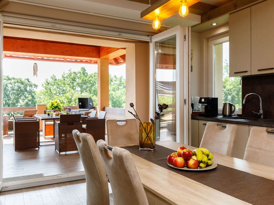 Countertop, Property, Table, Couch, Cabinetry, Kitchen, Kitchen Sink, Wood, Interior Design, Lighting
