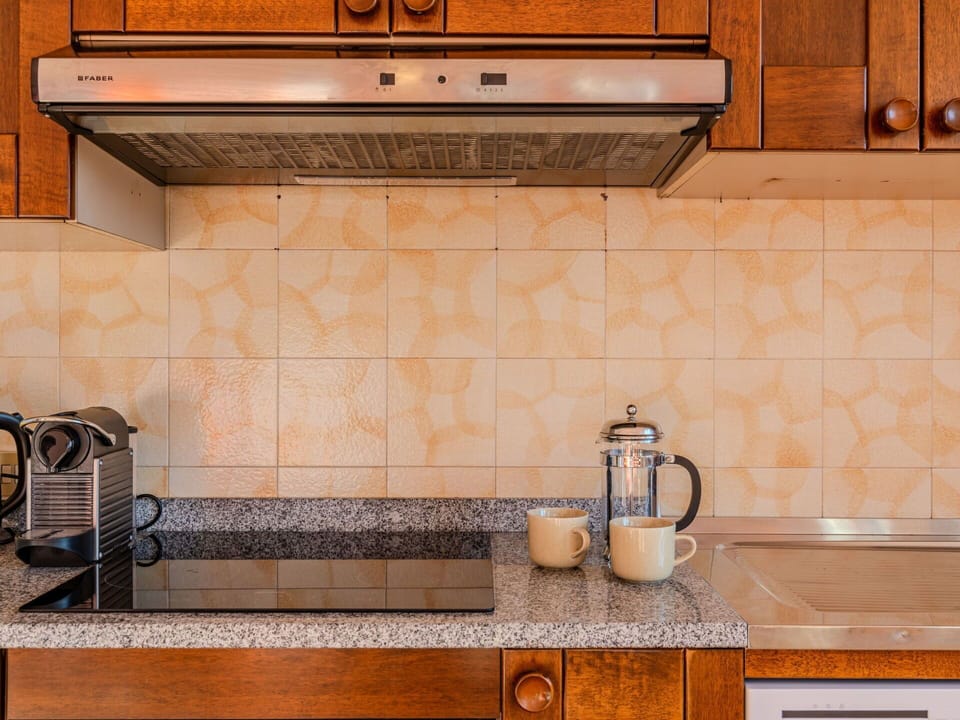 Countertop, Property, Cabinetry, Tableware, Kitchen, Kitchen Appliance, Wood, Kitchen Stove, Interior Design, Home Appliance