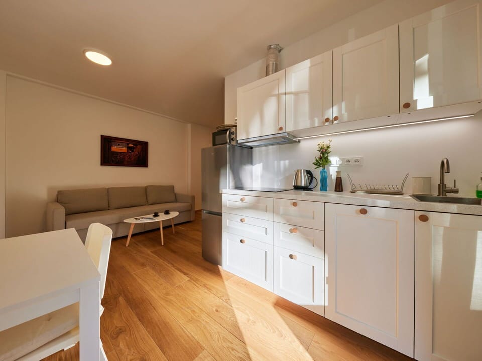 Cabinetry, Property, Countertop, Wood, Lighting, Interior Design, Building, Kitchen, Flooring, Floor