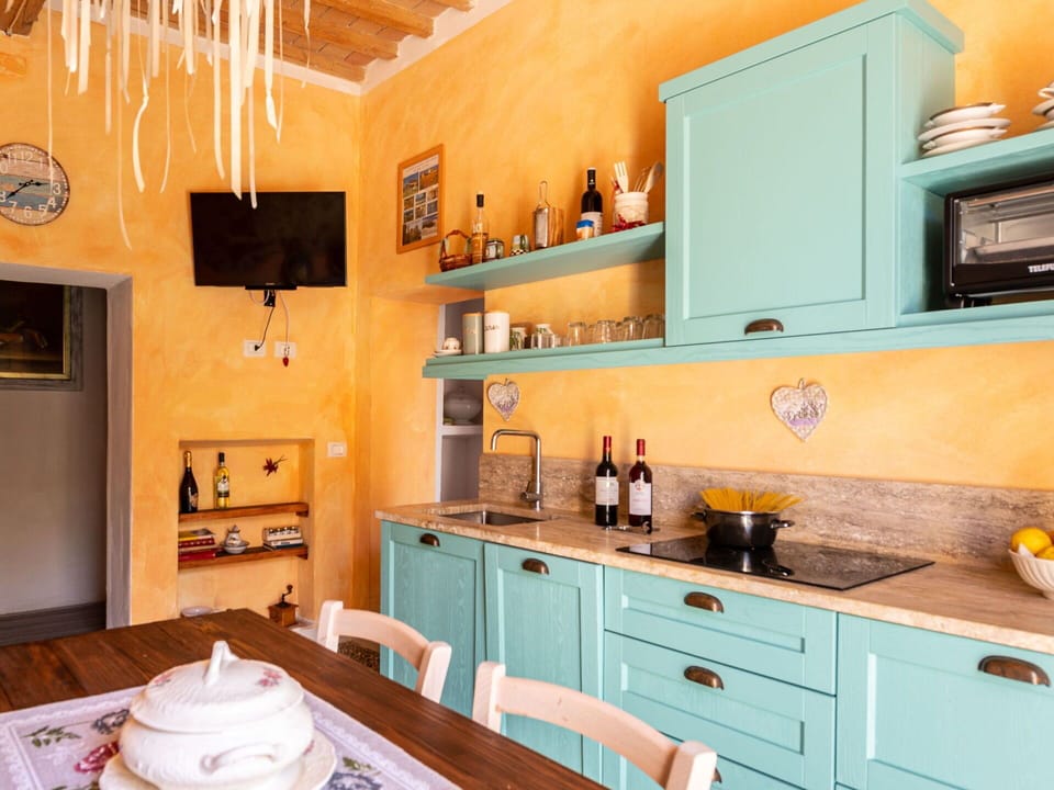 Cabinetry, Property, Furniture, Countertop, Wood, Kitchen, Interior Design, Drawer, Building, Yellow