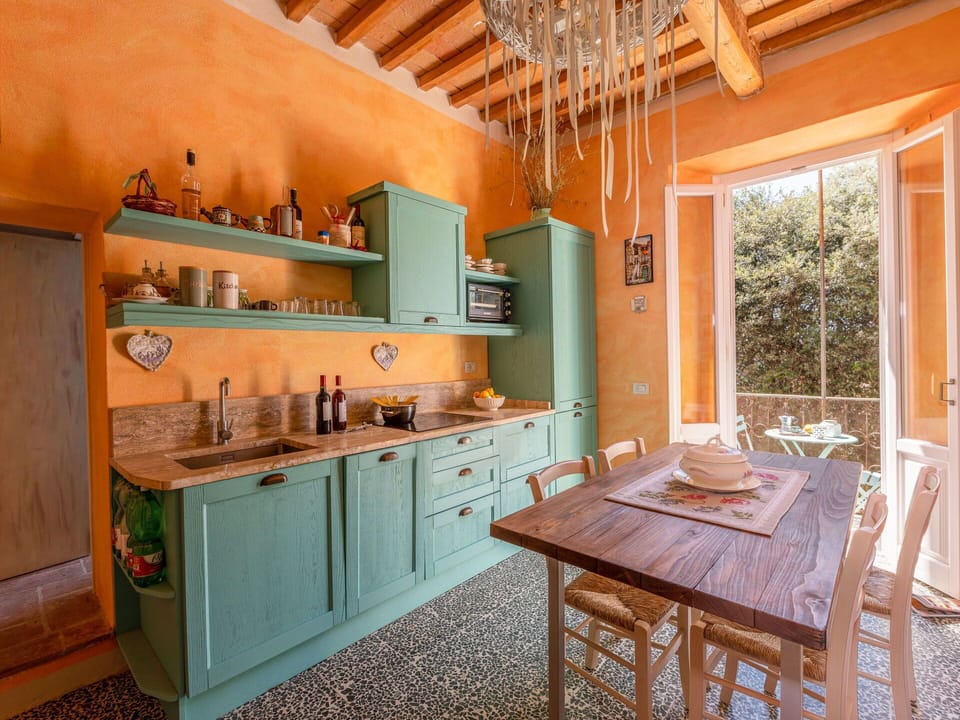 Cabinetry, Furniture, Property, Table, Countertop, Chair, Wood, Kitchen Appliance, Interior Design, Kitchen