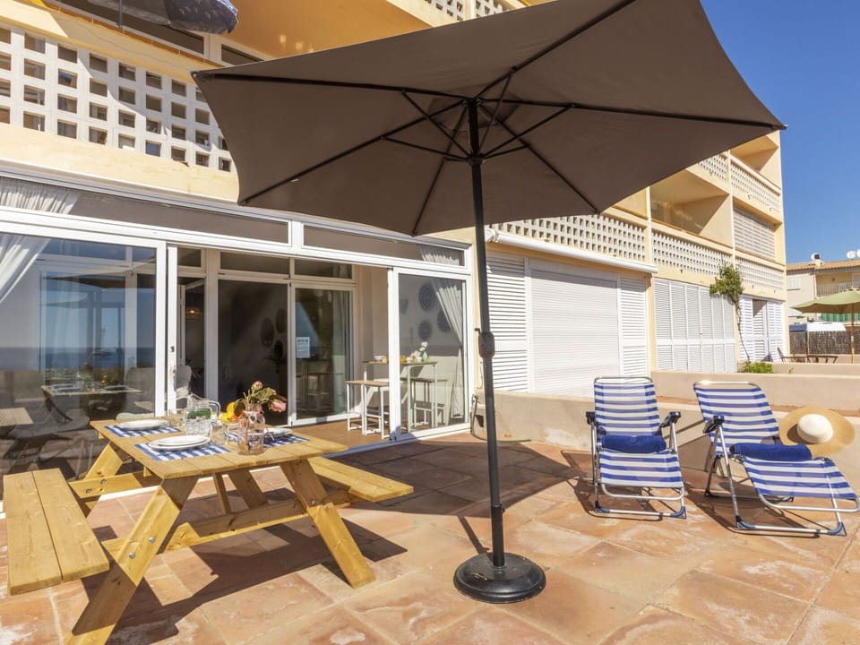 Furniture, Outdoor Furniture, Shade, Chair, Balcony, Wood Stain, Deck, Outdoor Table, Hardwood, Patio