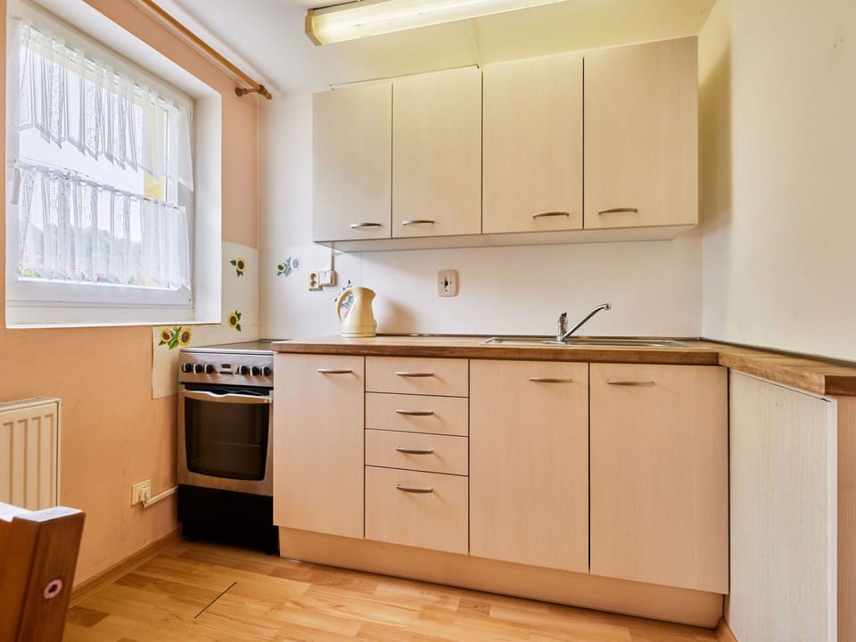 Cabinetry, Countertop, Property, Window, Drawer, Building, Kitchen, Wood, Interior Design, Flooring