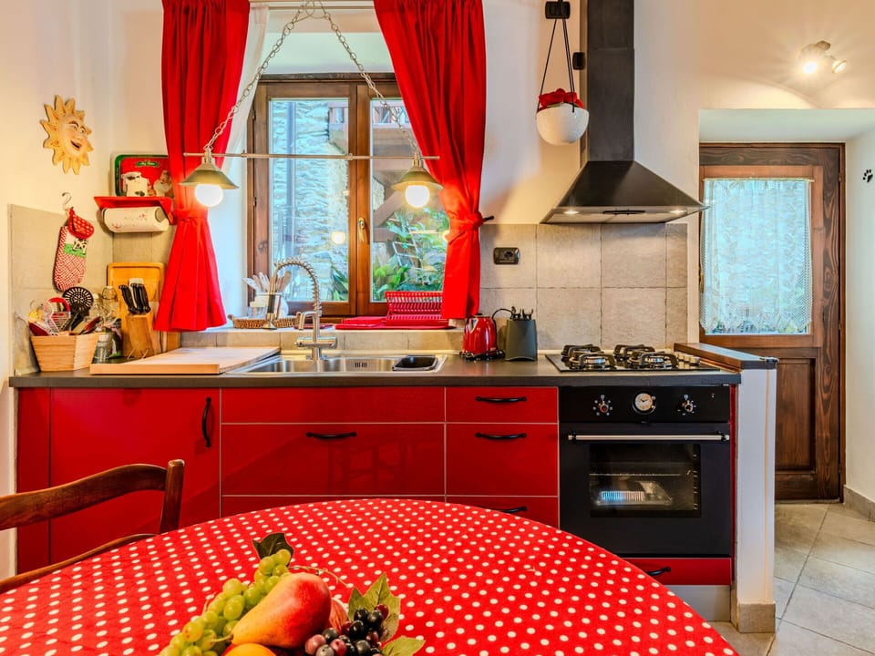 Furniture, Interior Design, Kitchen, Red, Wood, Flooring, Countertop, Room, Kitchen Appliance, Ceiling