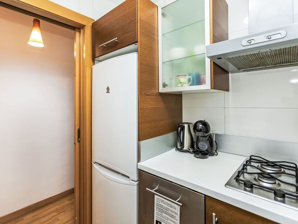 Cabinetry, Gas Stove, Countertop, Kitchen Stove, Kitchen Appliance, Cooktop, Kitchen, Wood, Home Appliance, Interior Design