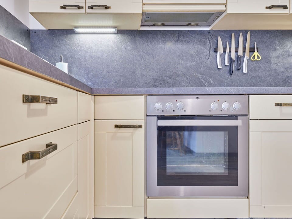 Cabinetry, Property, Countertop, Kitchen, Interior Design, Building, Flooring, Floor, Home Appliance, Wall