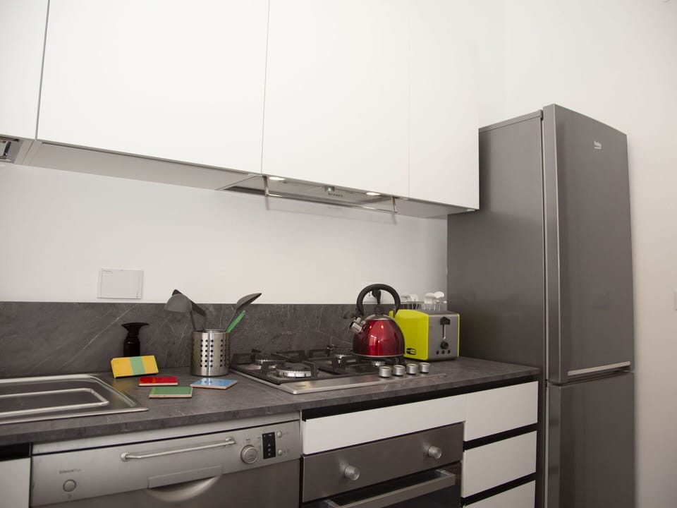 Cabinetry, Tap, Countertop, Building, Interior Design, Kitchen Stove, Kitchen, Kitchen Appliance, Drawer