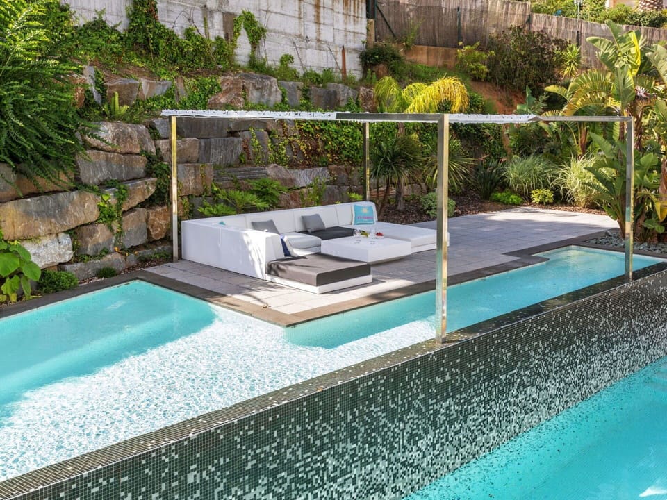 Water, Plant, Swimming Pool, Azure, Rectangle, Outdoor Furniture, Shade, Grass, Composite Material, Building
