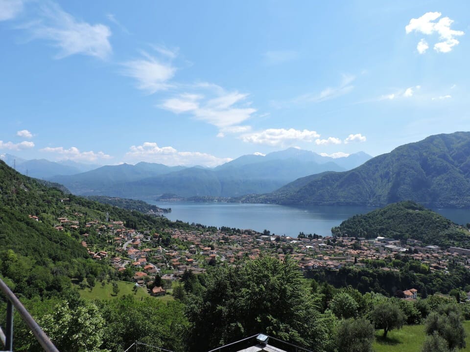 Cloud, Water, Sky, Mountain, Water Resources, Tree, Natural Landscape, Lake, Highland, Body Of Water