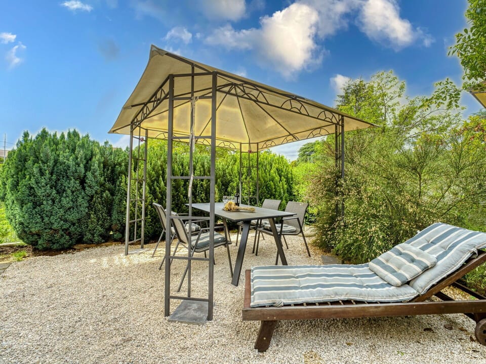 Table, Furniture, Plant, Sky, Property, Chair, Building, Cloud, Interior Design, Tableware