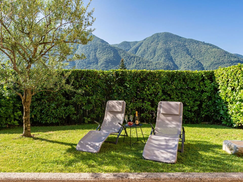 Sky, Plant, Furniture, Plant Community, Mountain, Natural Landscape, Tree, Outdoor Furniture, Chair, Land Lot