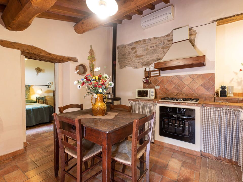 Furniture, Table, Wood, Chair, Living Room, Interior Design, Flooring, Floor, Flower, Hardwood