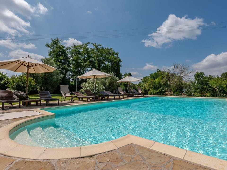 Water, Cloud, Sky, Property, Plant, Swimming Pool, Azure, Tree, Shade, Outdoor Furniture