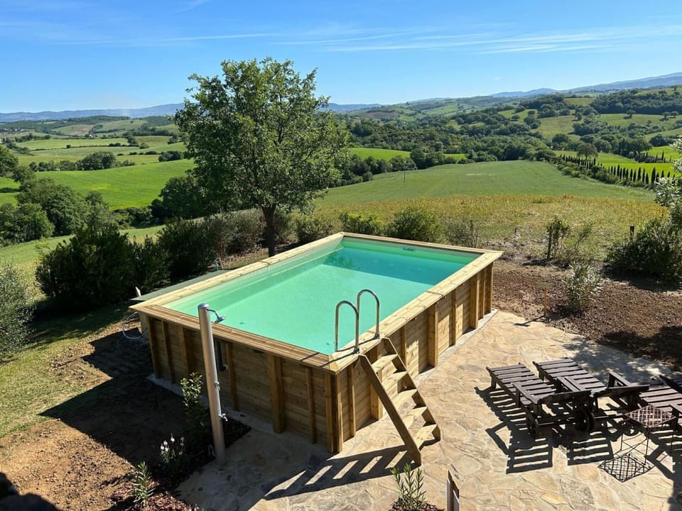 Water, Sky, Plant, Furniture, Swimming Pool, Building, Nature, Shade, Tree, Outdoor Furniture