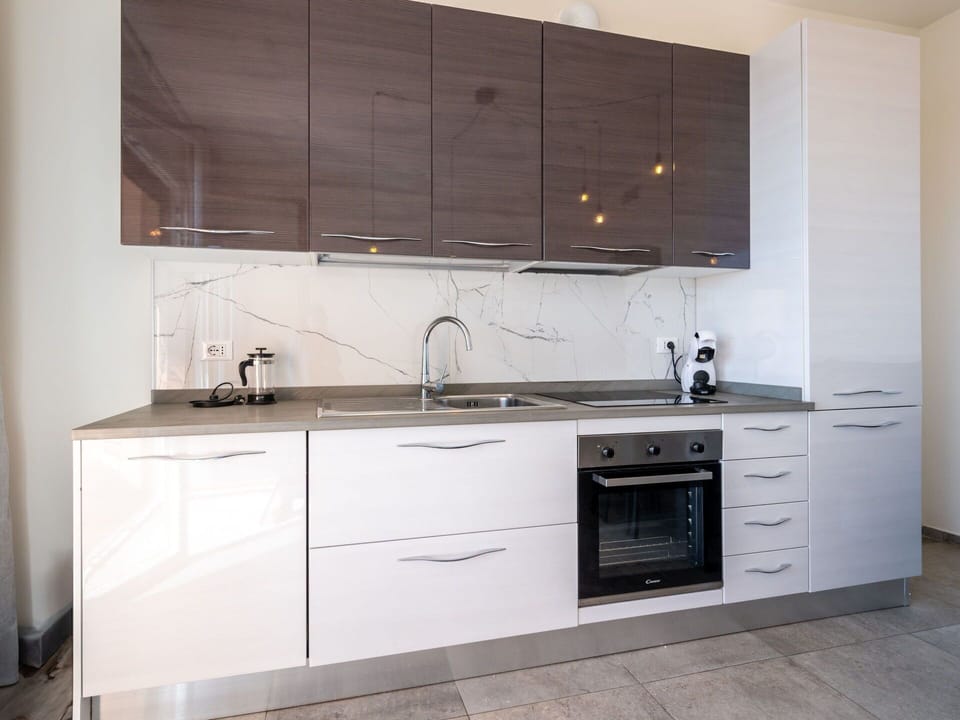 Cabinetry, Countertop, Kitchen, Flooring, Furniture, Wood, Kitchen Appliance, Drawer, Interior Design, Home