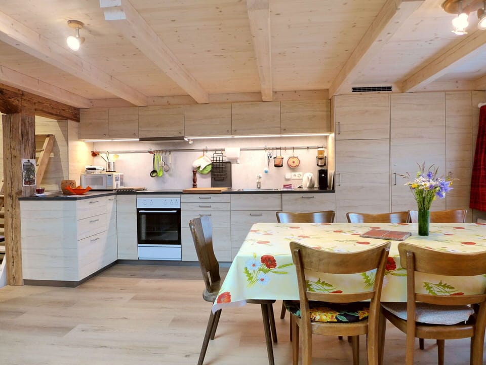Cabinetry, Furniture, Property, Countertop, Wood, Kitchen Appliance, Kitchen, Table, Lighting, Chair
