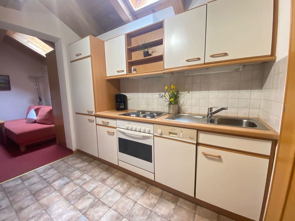 Cabinetry, Kitchen Sink, Furniture, Countertop, Sink, Tap, Building, Kitchen Stove, Kitchen, Wood