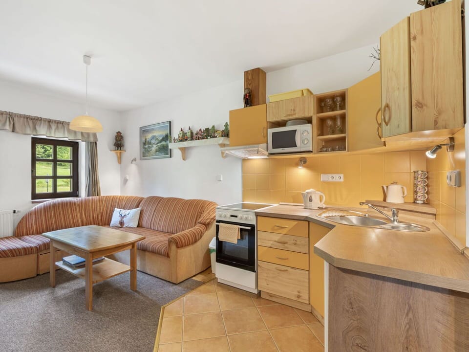 Furniture, Home, Cottage, Kitchen & Dining Room Table, Living Room, Chair, Wood Stain, Couch, Hardwood