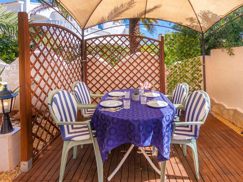 Water, Sky, Table, Furniture, Property, Chair, Azure, Outdoor Table, Outdoor Furniture, Tableware