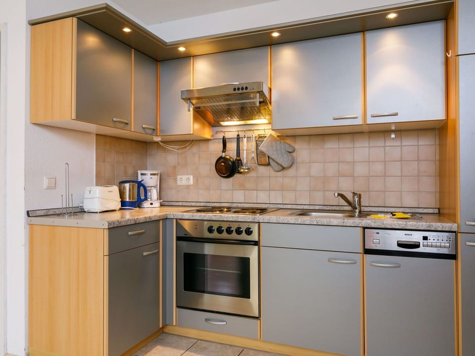 Countertop, Cabinetry, Building, Property, Tap, Sink, Furniture, Kitchen Stove, Kitchen Appliance, Kitchen