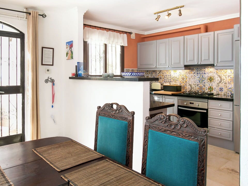 Furniture, Interior Design, Countertop, Kitchen, Flooring, Wood, Ceiling, Light Fixture, Room, Floor