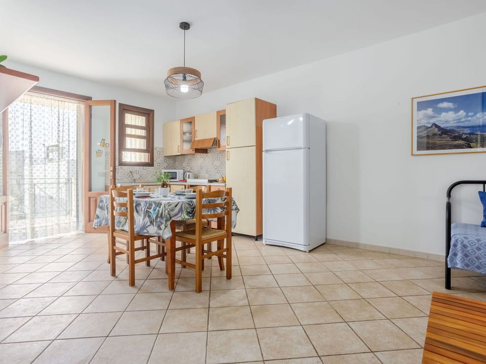 Table, Wood, Cabinetry, Flooring, Floor, Chair, Living Room, Wood Stain, Hardwood