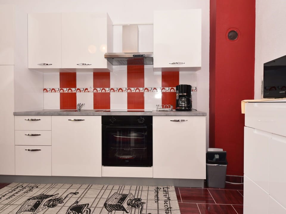 Cabinetry, Building, Countertop, Kitchen Appliance, Wood, Kitchen Stove, Flooring, Interior Design, Kitchen, Floor