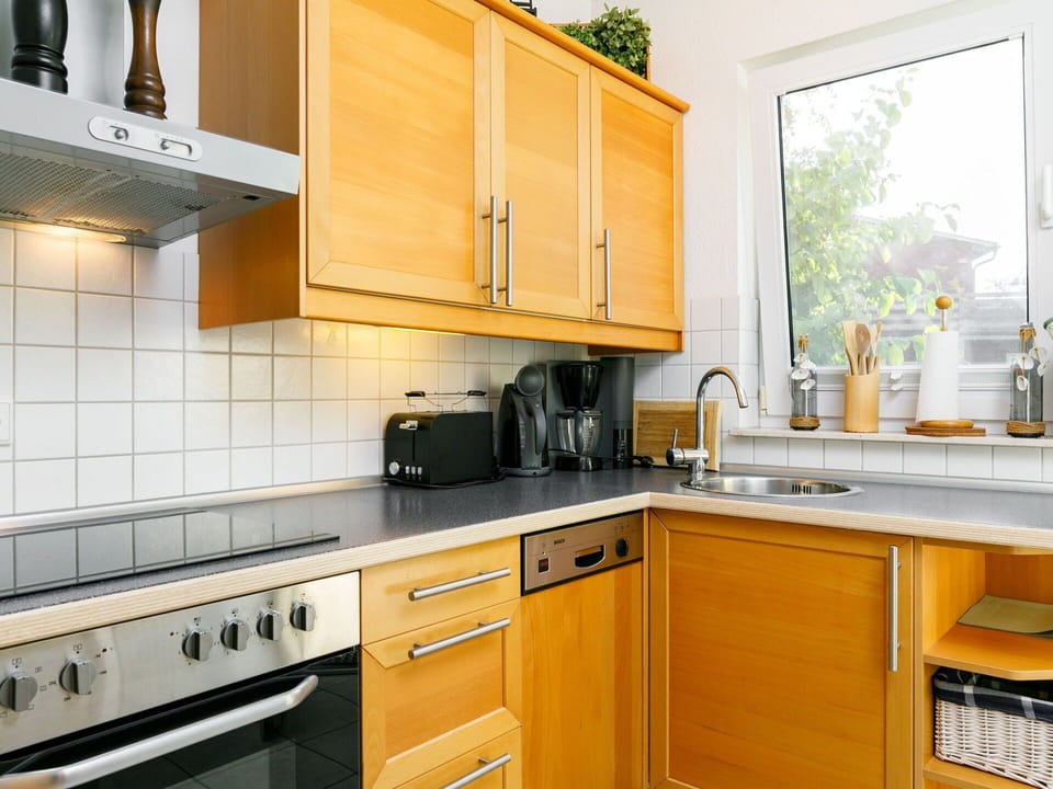 Countertop, Cabinetry, Property, Kitchen Sink, Furniture, Sink, Kitchen, Kitchen Stove, Wood, Interior Design