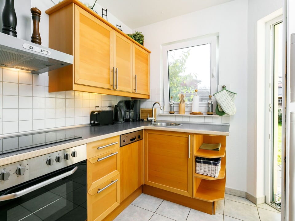 Cabinetry, Countertop, Property, Furniture, Sink, Kitchen, Kitchen Stove, Kitchen Appliance, Home Appliance, Wood