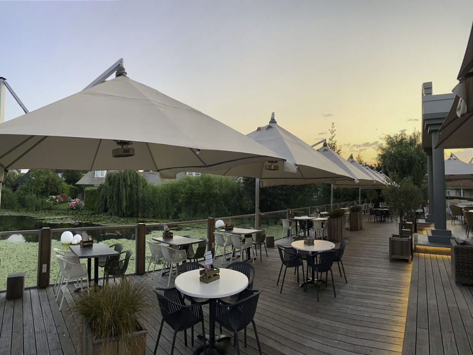 Table, Sky, Property, Furniture, Shade, Tent, Chair, Outdoor Furniture, Plant, Outdoor Table