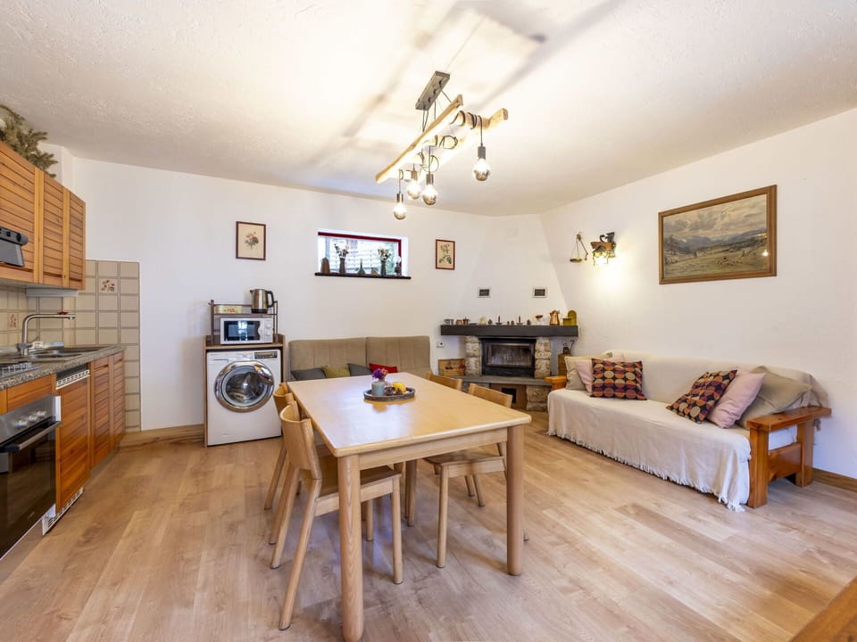 Furniture, Interior Design, Wood, Flooring, Room, Ceiling, Floor, Table, Lighting, Living Room