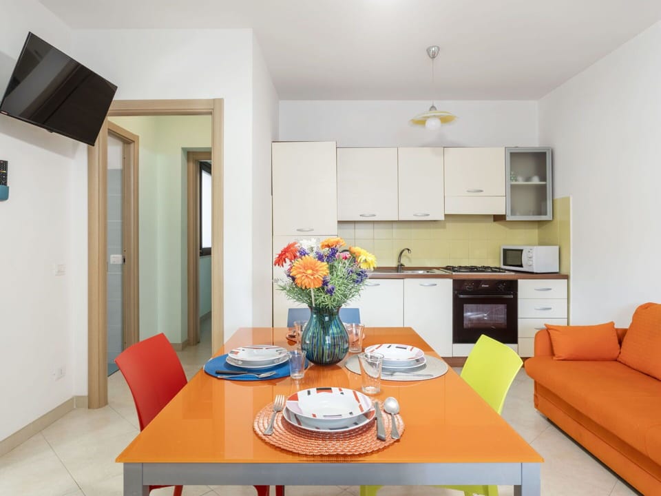 Table, Furniture, Property, Cabinetry, Couch, Orange, Living Room, Interior Design, Chair, Wood