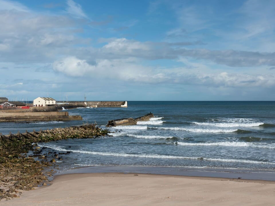 Sky, Blue, Water, Water Resources, Body Of Water, Coast, Natural Environment, Beach, Cloud, Coastal And Oceanic Landforms