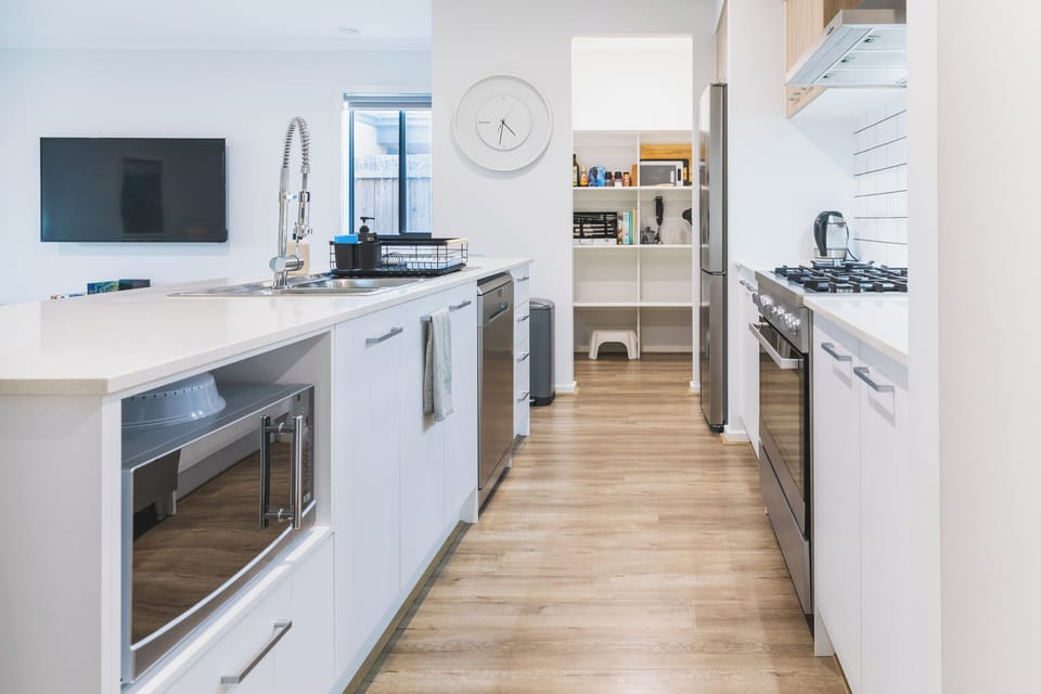 Fully Equipped Kitchen, large Oven and Cooktop, Dishwasher, Walk In pantry.