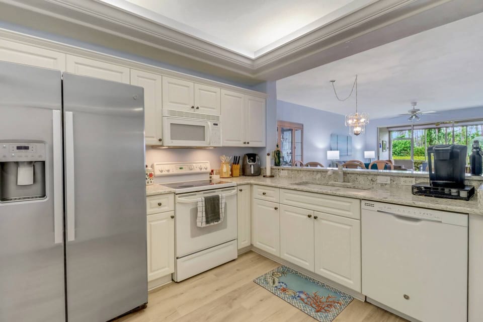 Cookware, dinnerware, many kitchen tools and small appliances are provided, including a Keurig coffee maker.