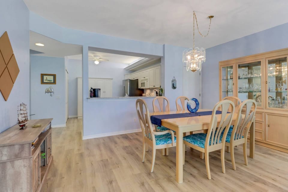 The kitchen opens to the dining area, making meal time and entertaining easy.