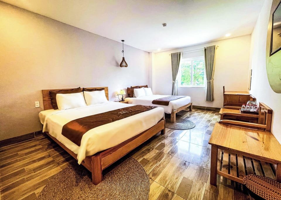Executive Quadruple Room, Garden View | Down comforters, pillowtop beds, minibar, in-room safe