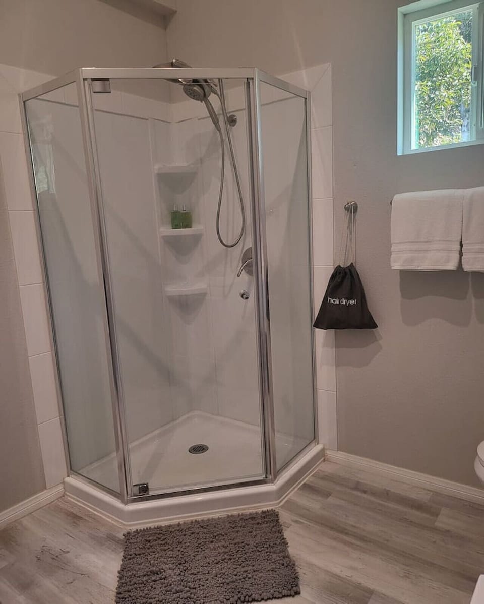 Shower with dual shower heads.