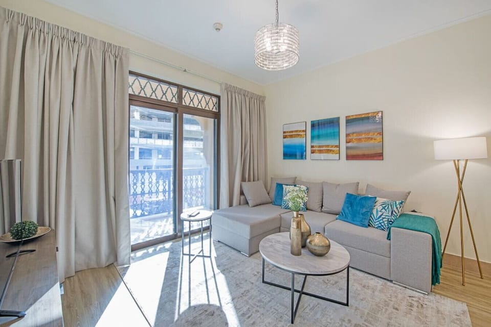 Living Room: Sunlit space with chic decor, perfect for relaxation and enjoying city views!