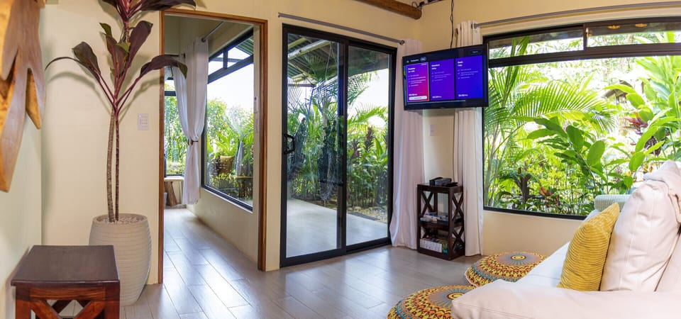 Living room leading to patio and garden