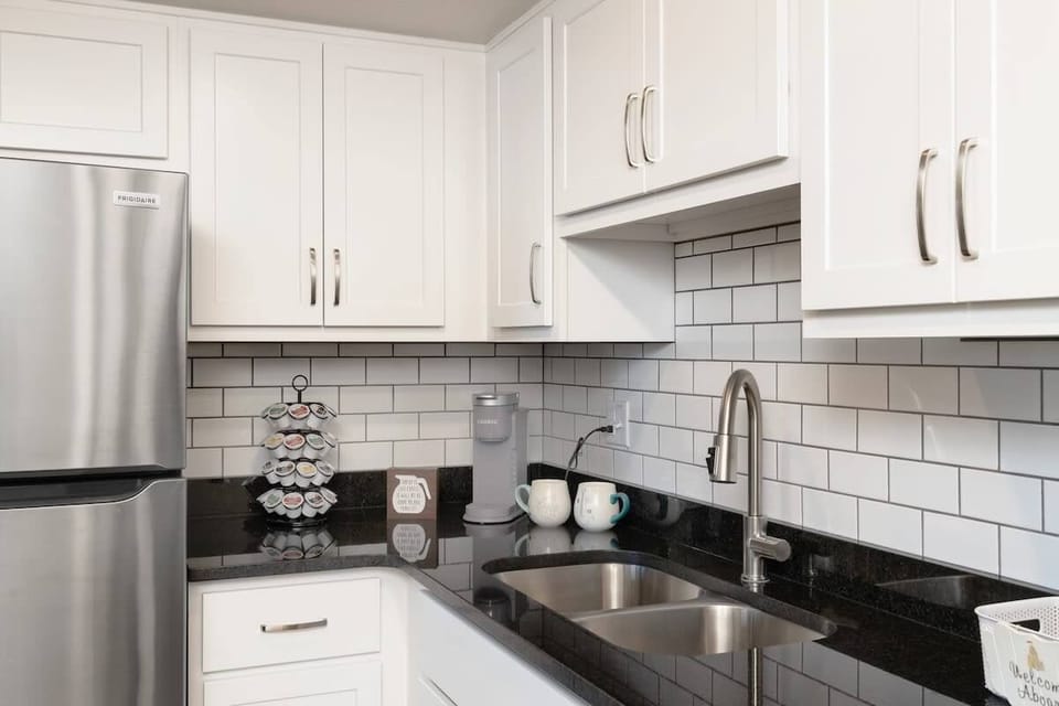 Grab your morning coffee from the coffee station with Keurig coffeemaker and coffee supplies.