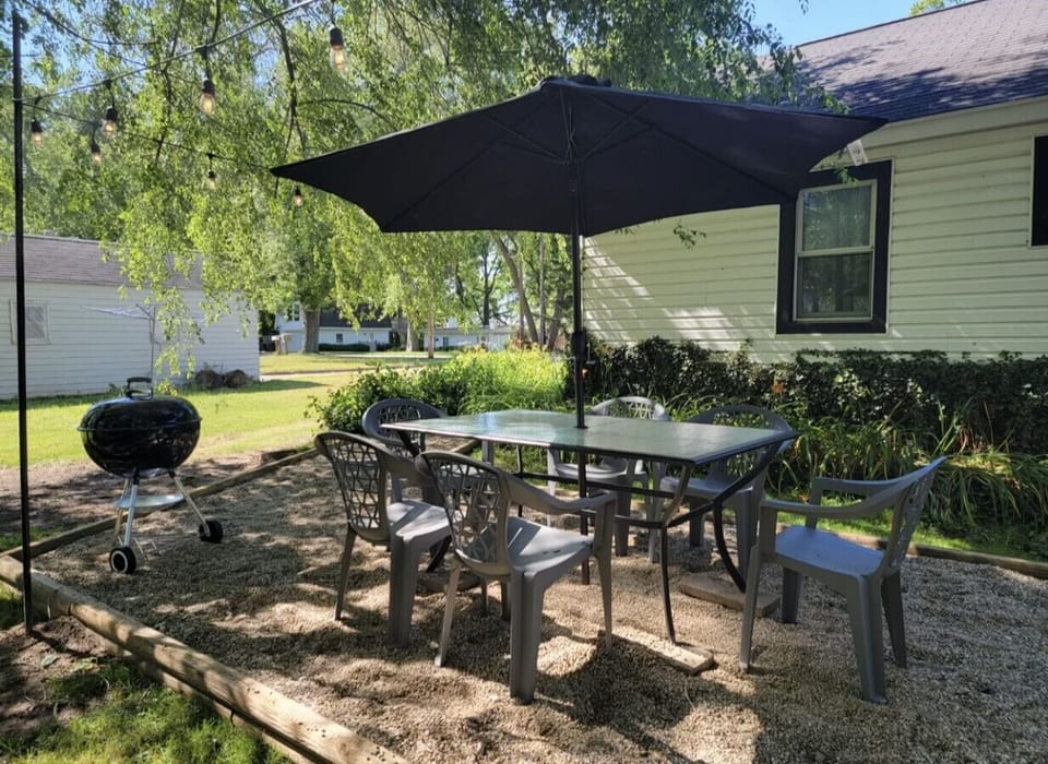 Outdoor Dining Area with Charcoal BBQ Grill