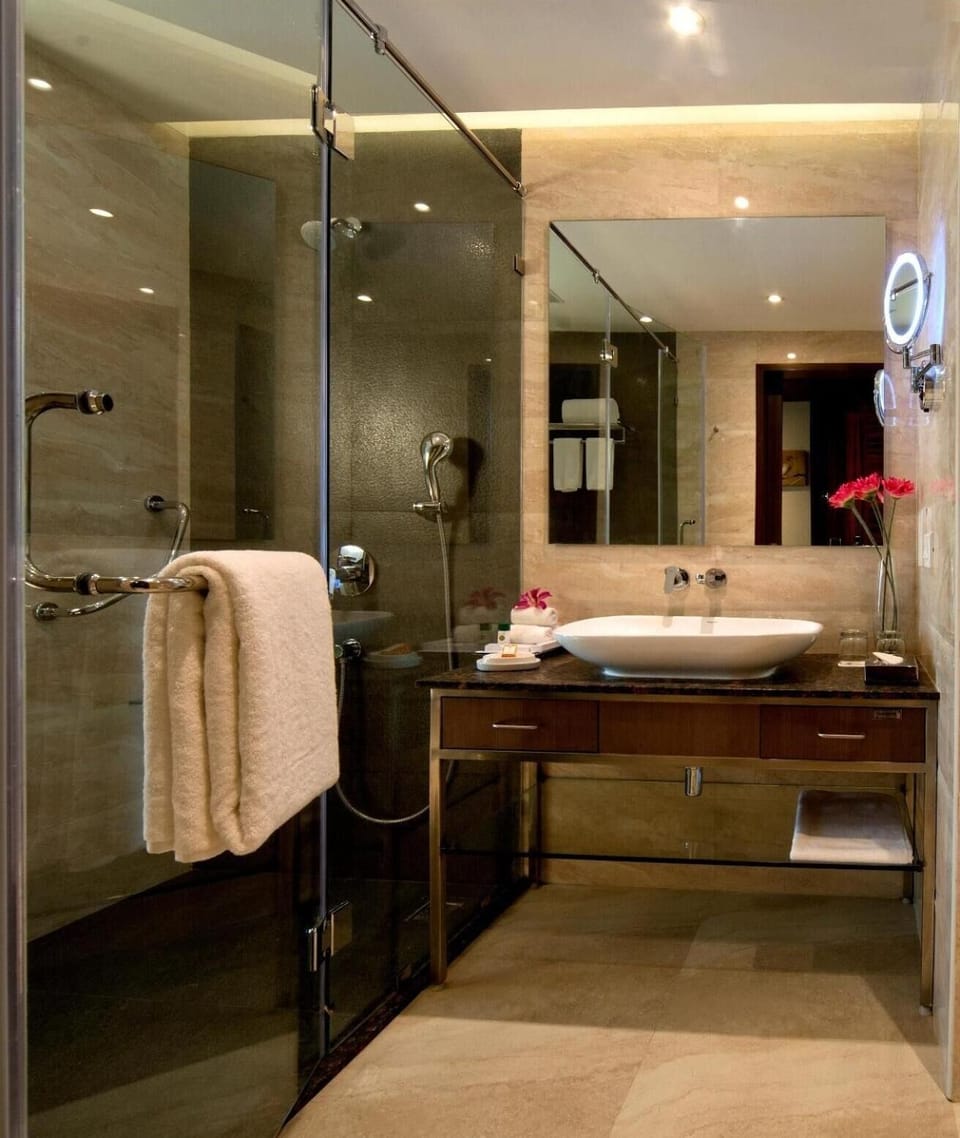 Shower, free toiletries, hair dryer, slippers
