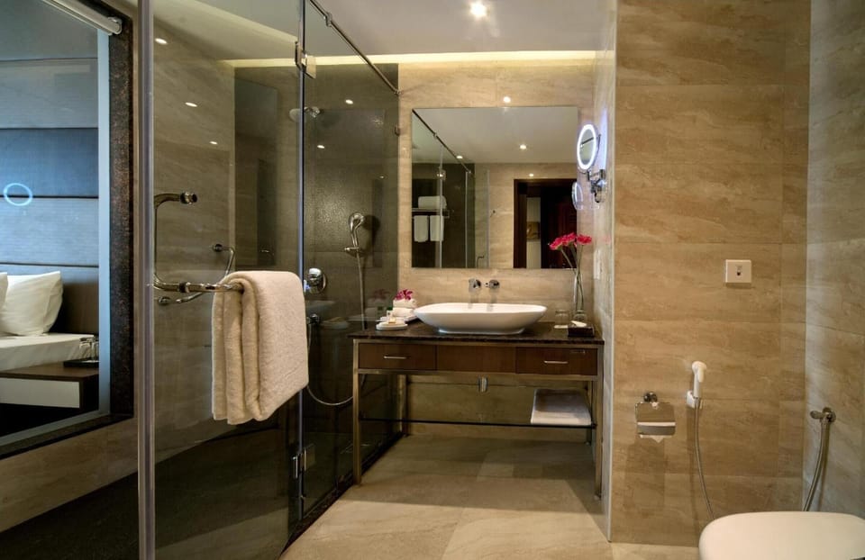 Shower, free toiletries, hair dryer, slippers
